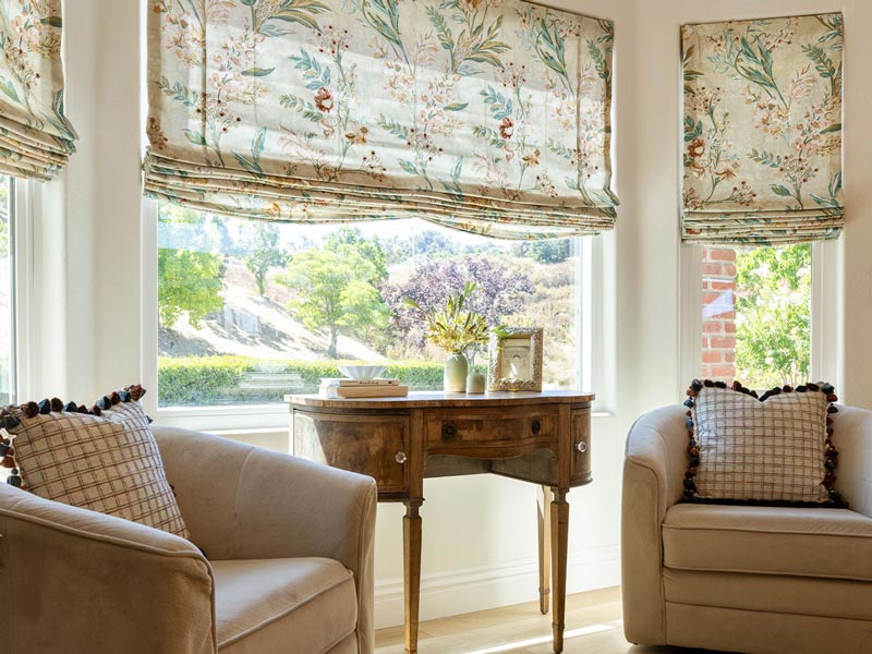 soft roman shades with floral pattern
